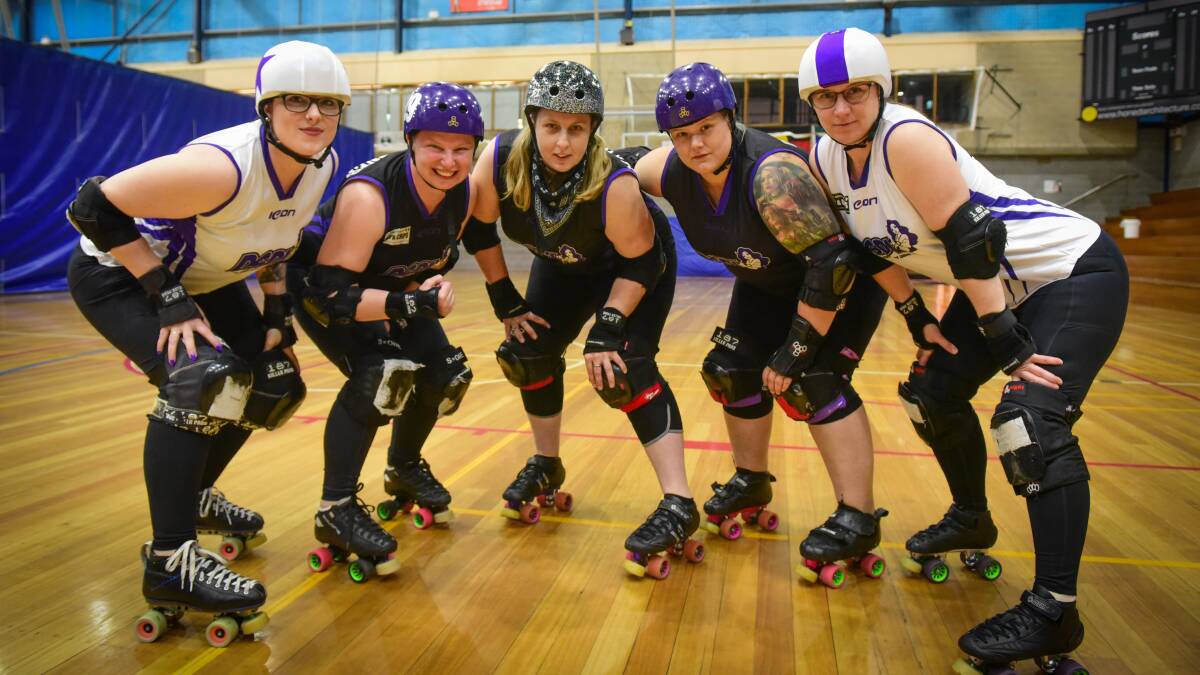 Players for the Devil State Derby League Nadia Coull, Tina Evans, Erin Roberts, Sophie Clark, and Veronica Treasure ready to rumble. Picture: Paul Scambler.
