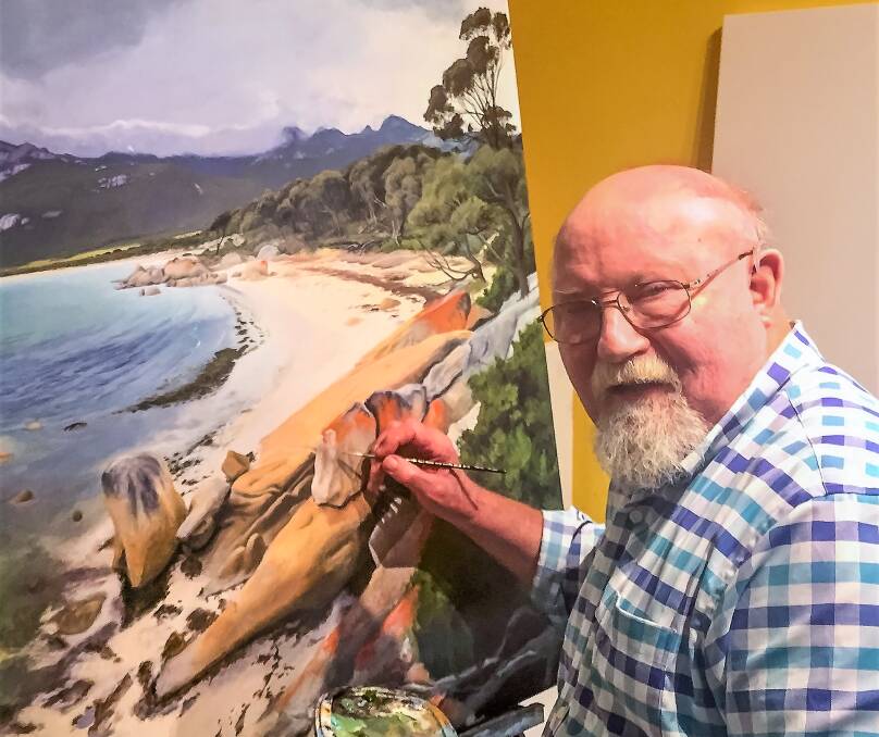 John E Gibb with his work that featured at Scottsdale Art Gallery. Picture: Supplied