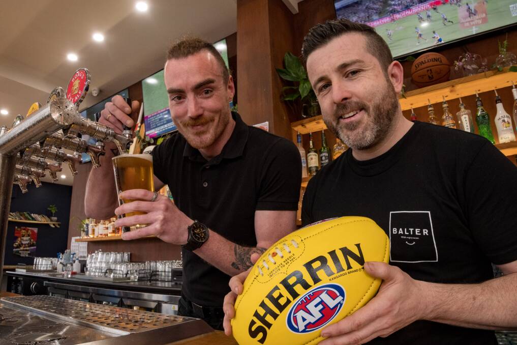 Sports Garden Hotel's Jack May and Shaun Spencer ready for the 2021 AFL grand final. Picture: Phillip Biggs