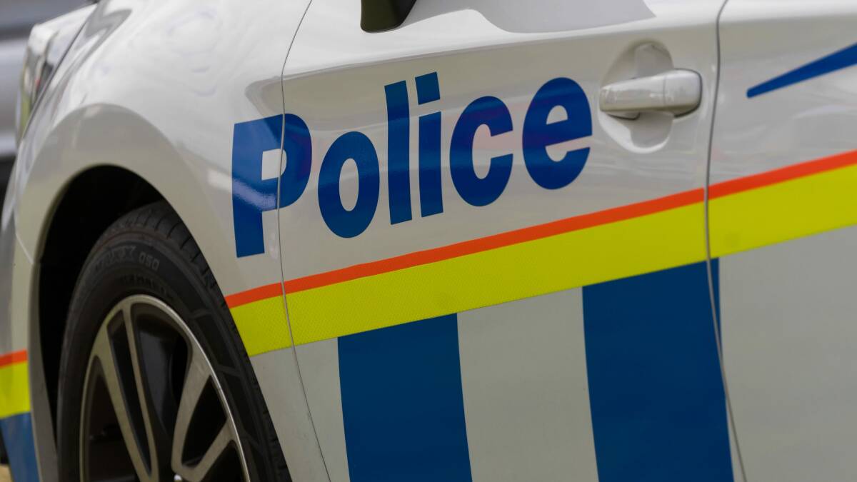 Two men charged after alleged Launceston hotel armed robbery