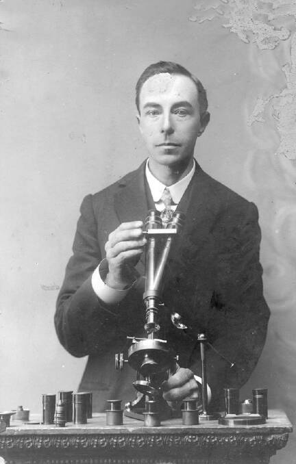 Portrait of H.H. Scott, with a binocular microscope, early 1900s. Picture: Burrows & Co