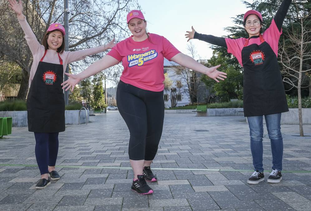 JOINING FORCES: World Street Eats co-organisers Jaewon Chae and Pearl Chinthammit with Cancer Council Tasmania's Women's 5K coordinator Zoe Vandervelde. Picture: Craig George
