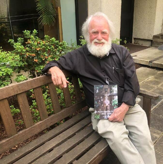 Paul Richards with new book on the history of St Paul's Anglican Church from 1854 until 2020. Picture: Dana Anderson
