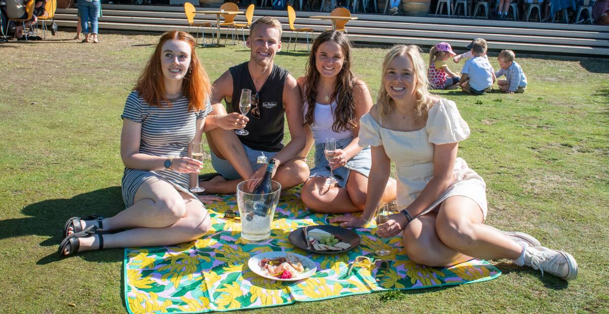Hannah Knowles and Lachie Bean, of Riverside, with Ruby Frelek and Lauren Perry, of West Launceston, at the Tamar Ridge Cellar door. Picture: Paul Scambler 