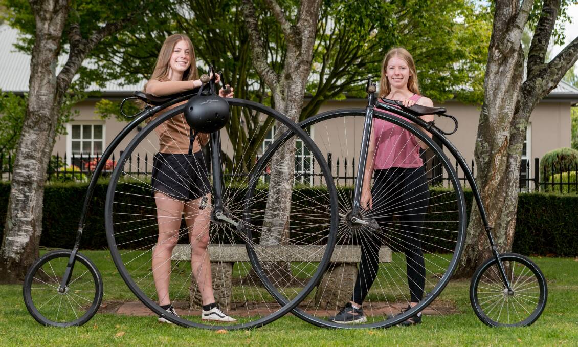 Bridie and Claire Maynard, of Evandale, prepare for the National Evandale Penny Farthing Championships. Picture: Phillip Biggs