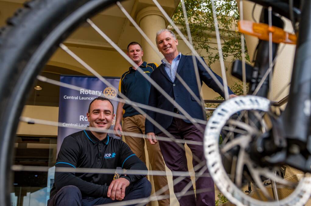 Tamar Valley Cycling Challenge committee chair Chris Griffin, Rotary Club of Central Launceston president Scott Town, and JCP Youth director Will Smith. Picture: Phillip Biggs