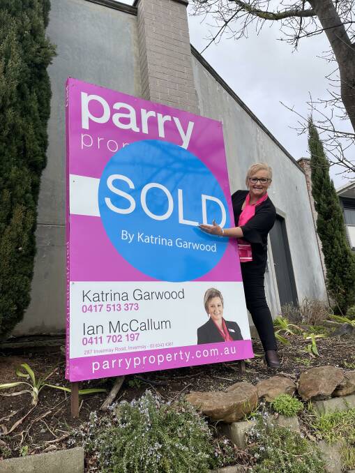Sold sign officially on the house. 