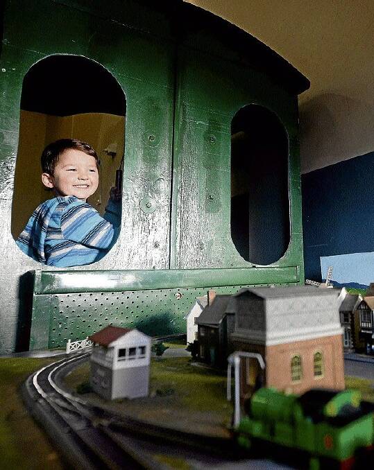 George Durkin, 3, of Newstead, operating a U-drive display from a steam engine cabin at yesterday's North Rail Model Expo.Picture: MARK JESSER
