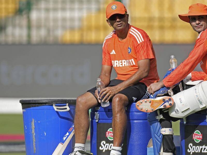 The Board of Control for Cricket in India has extended the coaching reign of Rahul Dravid (left). (AP PHOTO)