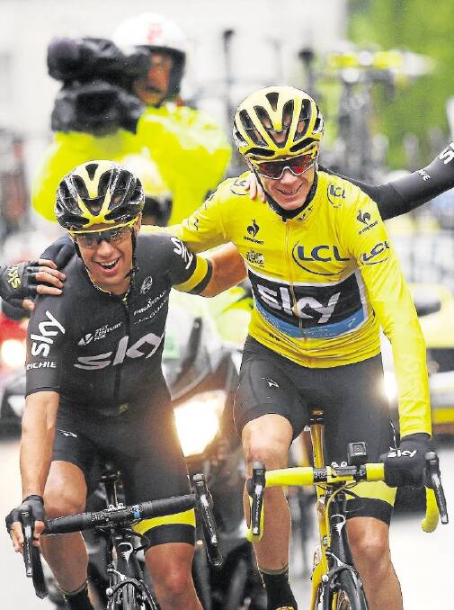 PARIS, FRANCE - JULY 26:  Chris Froome (R) of Great Britain and Team Sky celebrates overall victory with team mate Richie Porte (L) of Australia and Team Sky during the twenty first stage of the 2015 Tour de France, a 109.5 km stage between Sevres and Paris Champs-Elysees, on July 26, 2015 in Paris, France.  (Photo by Bryn Lennon/Getty Images)