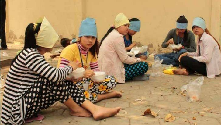 Garment factory workers in Cambodia during their lunch break. Photo: Asia Floor Wage Alliance
