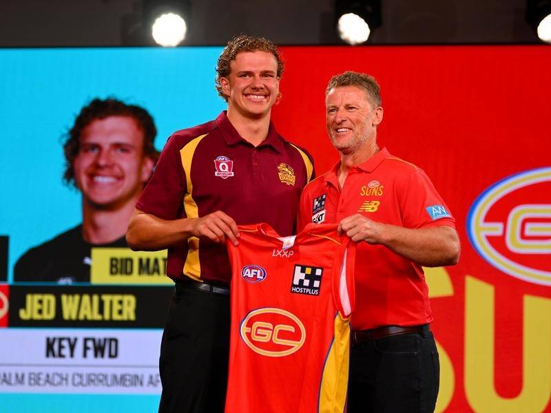 Jed Walter (l) was one of four early picks for Gold Coast's Damien Hardwick (r) in the AFL draft. (Morgan Hancock/AAP PHOTOS)