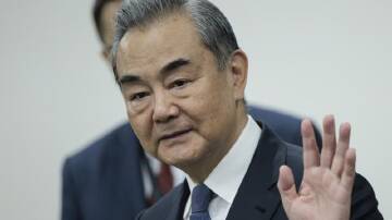 Foreign Minister Wang Yi is expected to sign an economic co-operation deal during his PNG visit. (AP PHOTO)