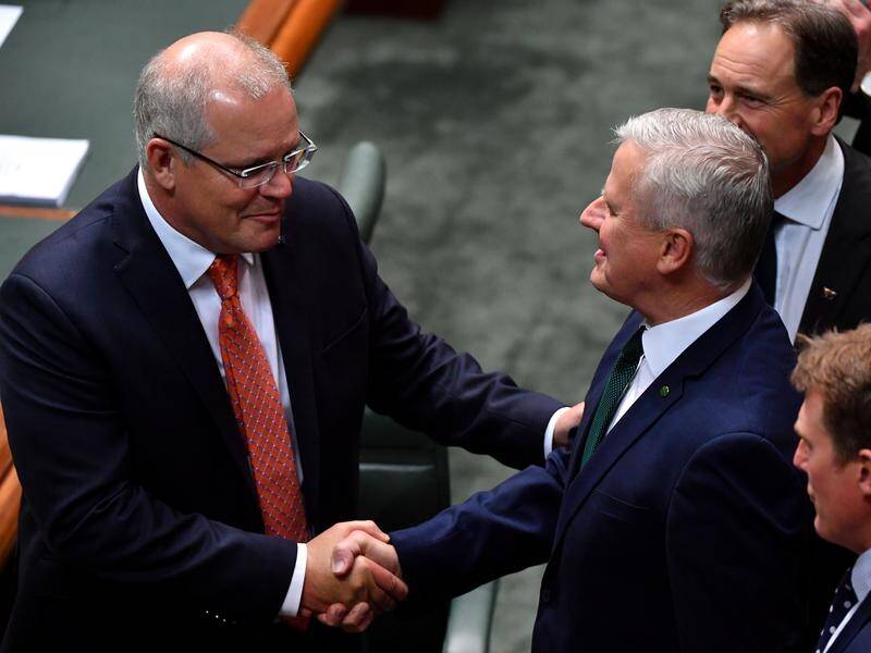 The government has notched its first major win with its tax cuts package clearing parliament.