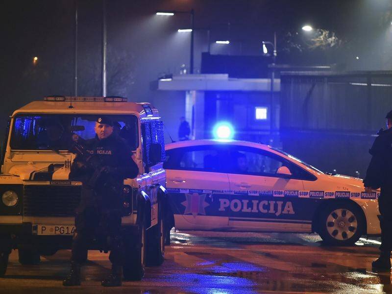 A man has thrown a bomb at the US embassy in Montenegro's capital before blowing himself up.
