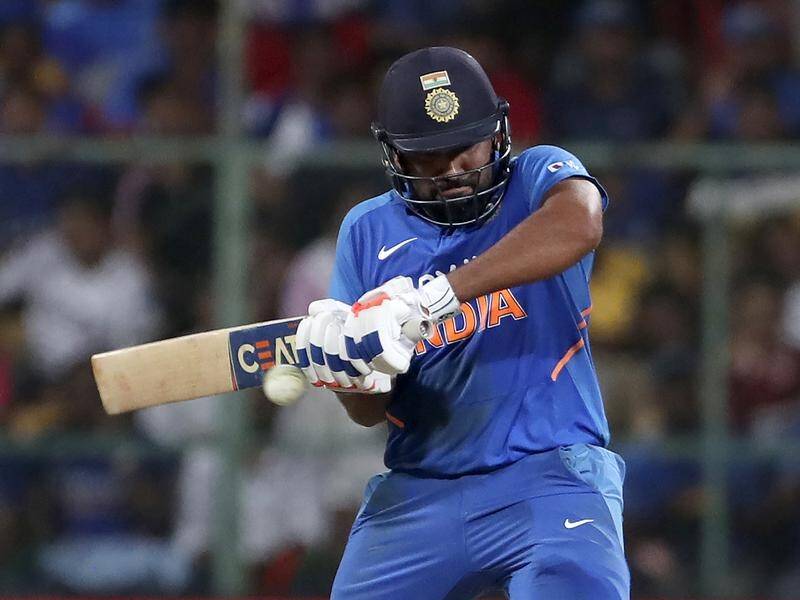 India's Rohit Sharma smashed 119 in India's seven-wicket victory over Australia in Bangalore.