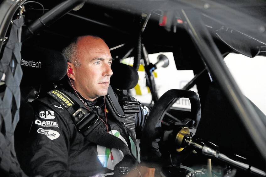Tasmania's Marcos Ambrose prepares to drive in the SuperTest at Sydney's Motorsport Park. Picture: GETTY IMAGES