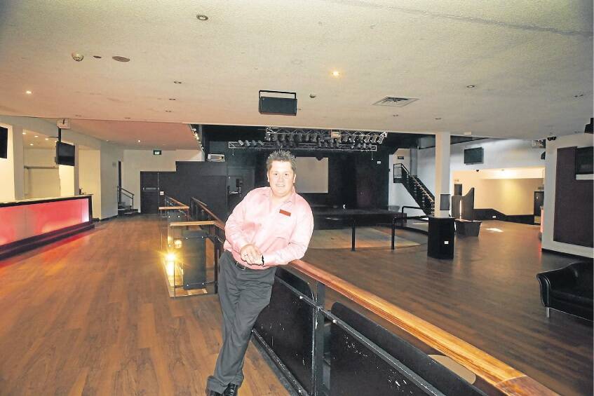 Hotel Tasmania manager Matt Harris in the venue's renovated band area. Picture: PAUL SCAMBLER