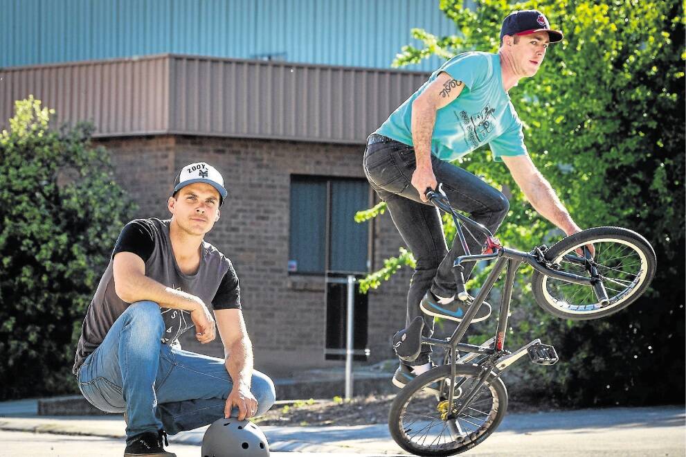 BMX flatland riders Chris Letchford and Matt Wootton are heading to a competition in Japan. The sport involves tricks from the ground instead of using ramps or jumps. Picture: PHILLIP BIGGS