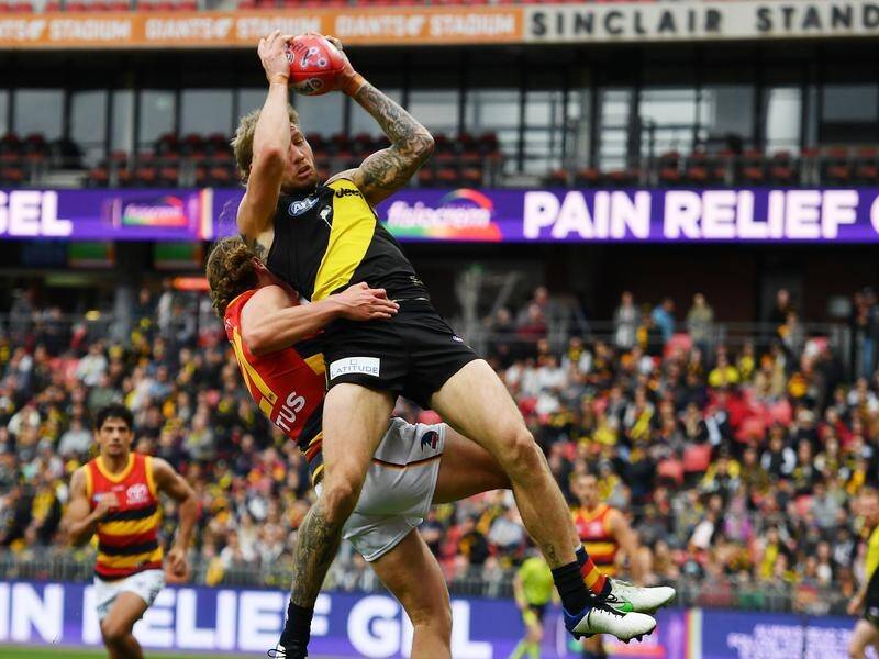 Richmond are back in the AFL top eight after they were pushed to a 28-point win against Adelaide.
