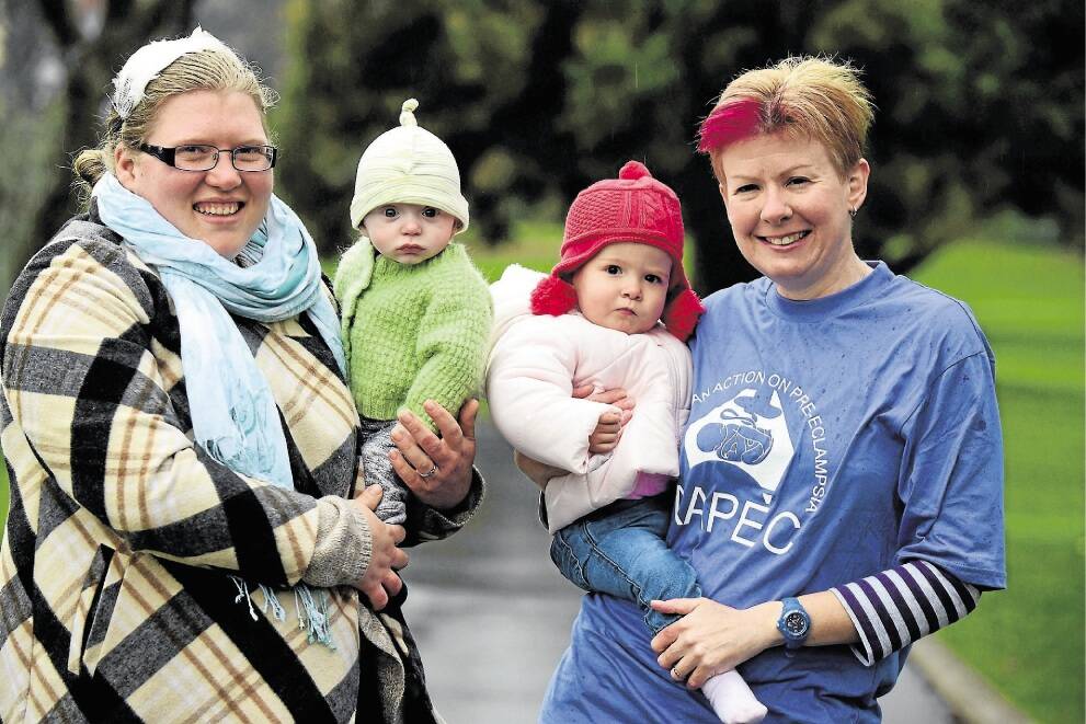 Philippa Coulson with her son Samuel, seven months, and Belinda Rees with daughter Chloe, 18 months, get ready for the Launceston Pre-eclampsia Awareness Walk on August 23 at Royal Park. Picture: PAUL SCAMBLER