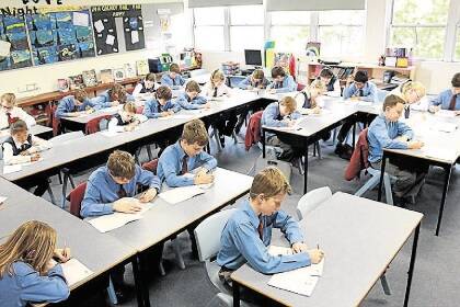 NCH NEWS - year 5 students at St Johns Primary School in Lambton attempt the Newcastle Permanent  Primary School Mathematics Competition   -27th August 2014 picture by Ryan Osland