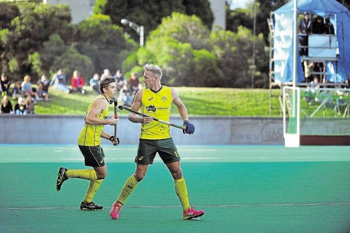 Tim Deavin and Eddie Ockenden competing at the Australian hockey international in Hobart. The pair are in fine form ahead of the 2016 Olympic selection.