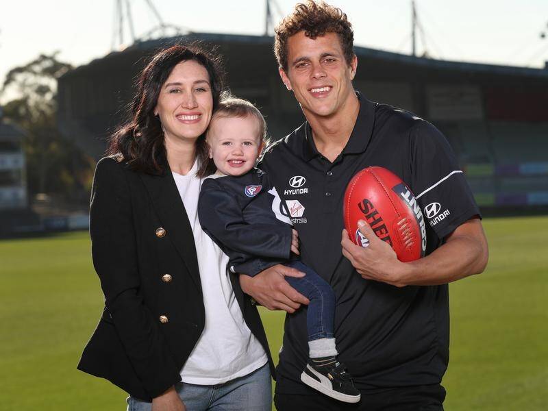 Carlton's Ed Curnow is among the hundreds of AFL players with a young family.