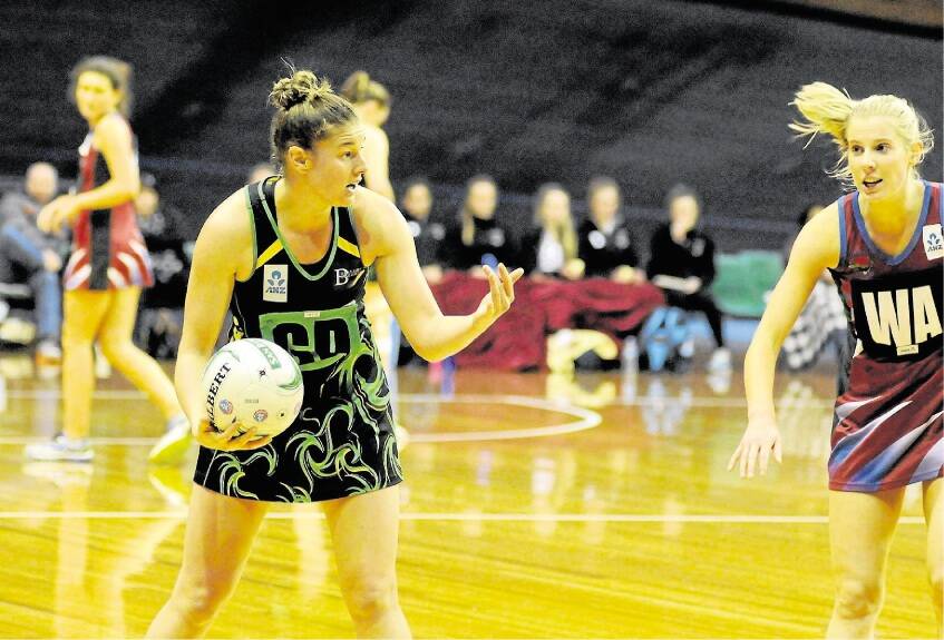 Cavaliers player Dannie Carstens is goal defence for the State Netball League's Open All-Stars team.