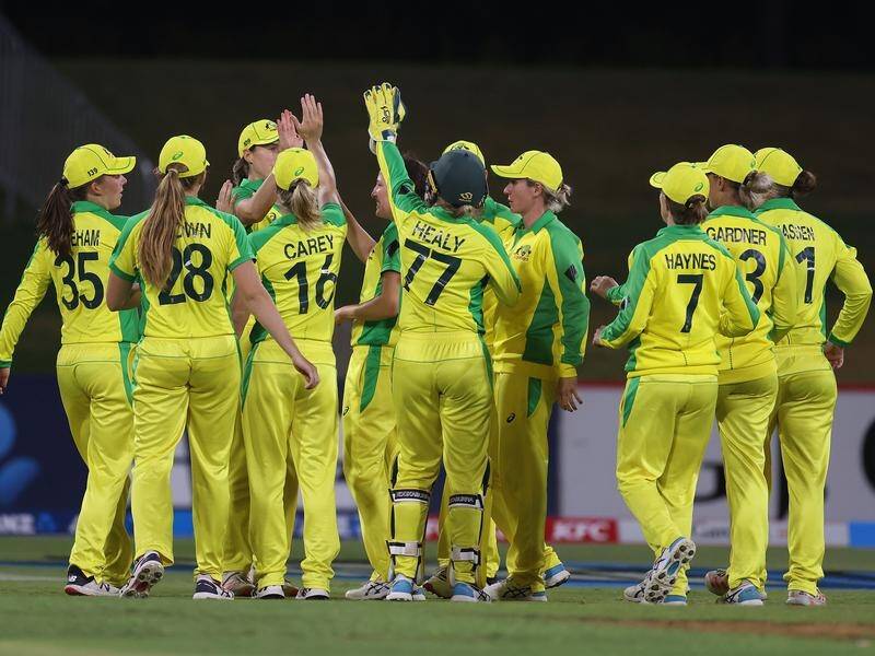 Australia celebrate another wicket during their record-extending 21-run ODI win over New Zealand.