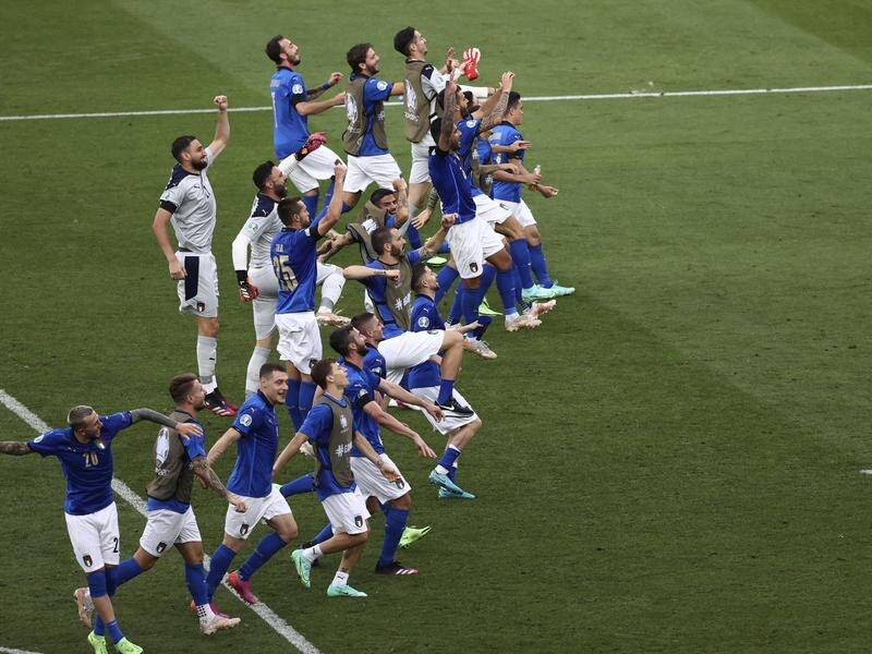 Italy celebrate in the Stadio Olimpico after their 1-0 win over Wales at the European Championships.