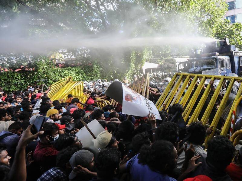Police used water cannons against a protest trying to make its way towards the president's house.