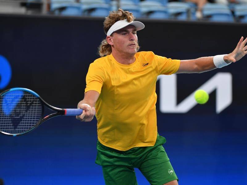 Max Purcell playing for Australian captain Lleyton Hewitt at last week's ATP Cup.