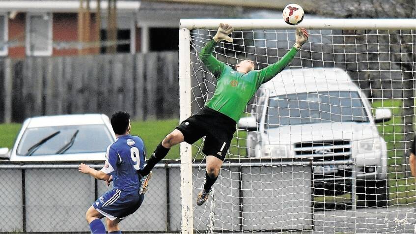 Launceston City's David Smith making a miraculous save against Olympia ... Smith has been named in the Victory League's team of the year.