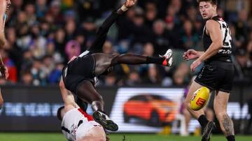 Port Adelaide's Aliir Aliir suffered concussion after being tackled by St Kilda's Jack Higgins. (Matt Turner/AAP PHOTOS)