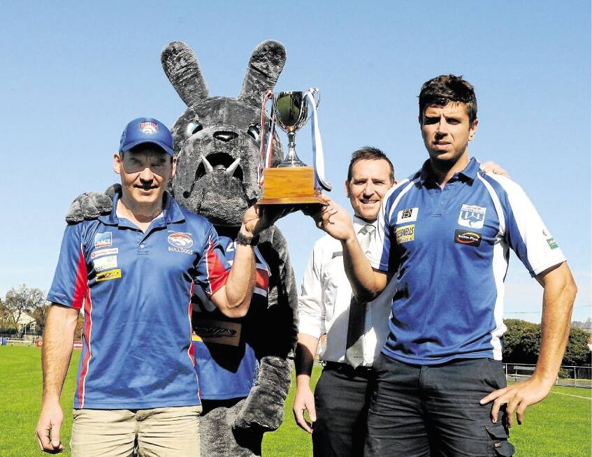 South Launceston coach Aaron Viney, South's mascot, Bendigo Bank Kings Meadows branch manager Mark Ross and Deloraine coach Rory Mansell. Picture: NEIL RICHARDSON