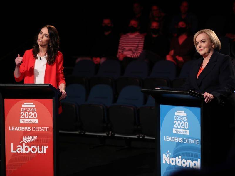New Zealand PM Jacinda Ardern (left) has had a fiery debate with election rival Judith Collins.