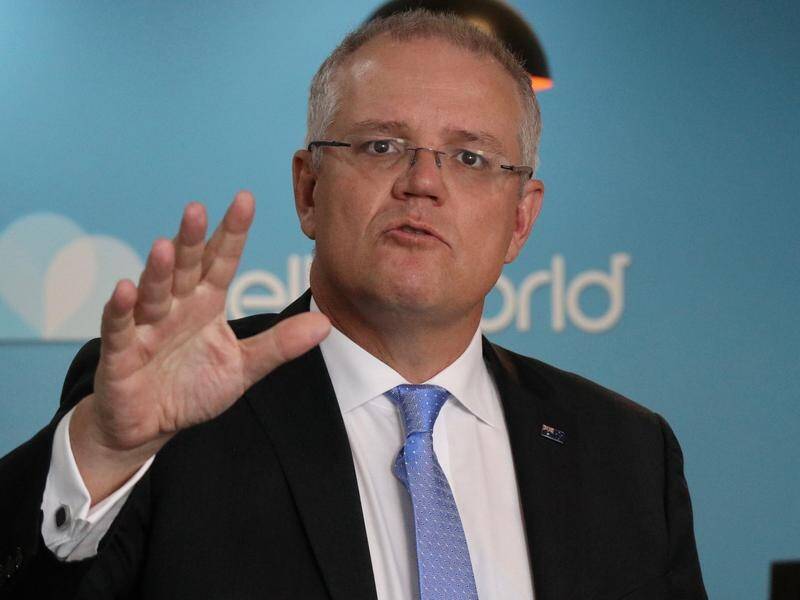 Treasurer Scott Morrison has slapped down Tony Abbott's call to cut the permanent migration level.