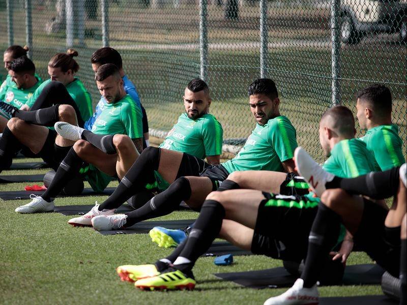 The first lot of Socceroos players have begun training at their pre-World Cup camp in Turkey.
