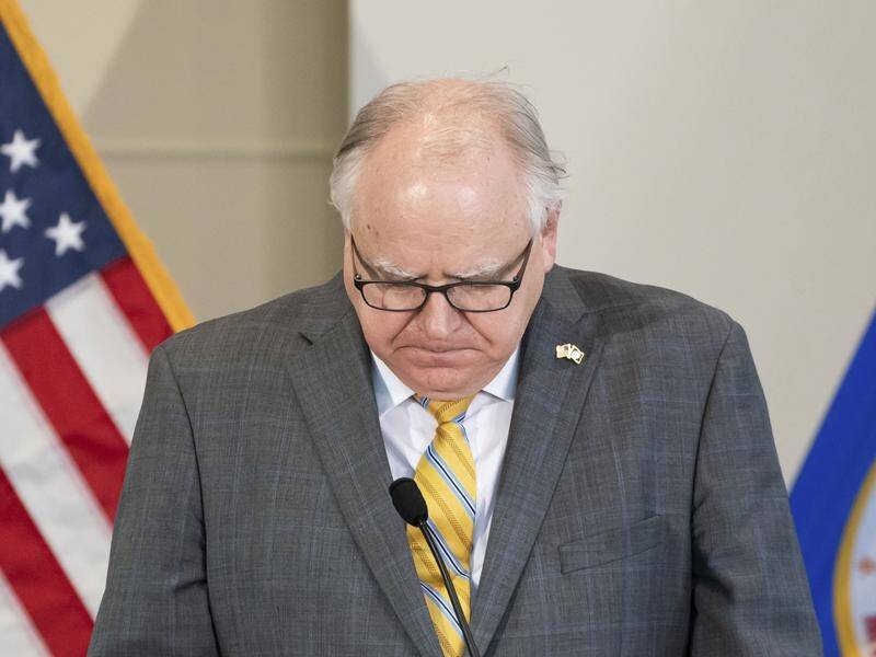 Minnesota Governor Tim Walz has apologised to broadcaster CNN after a reporter was arrested.