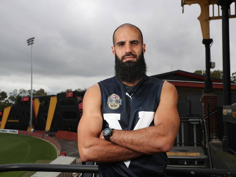 Richmond AFL player Bachar Houli has warned others not to underestimate COVID-19.