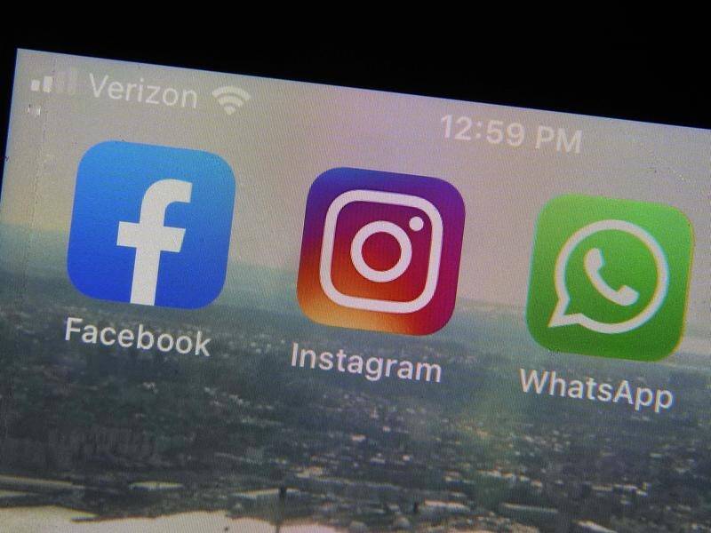 Facebook, Instagram and WhatsApp have been restored after users experienced outages. (AP PHOTO)