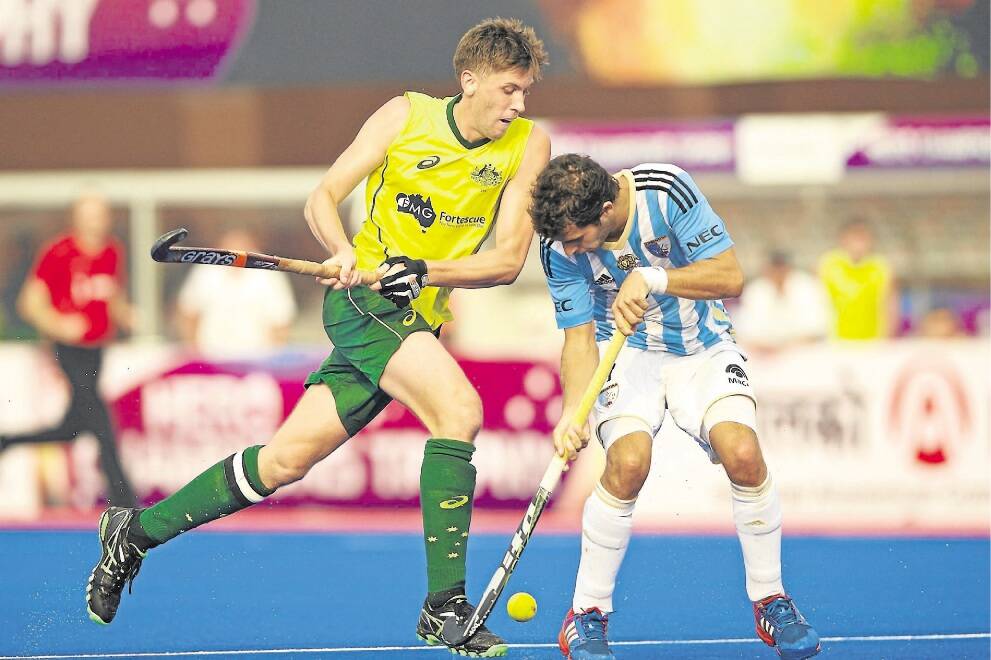STARRING ROLE: Eddie Ockenden, of the Kookaburras, in action against Argentina at Kalinga Hockey Stadium in Bhubaneswar, India. Picture: DAN CARSON/DCIMAGES.org
