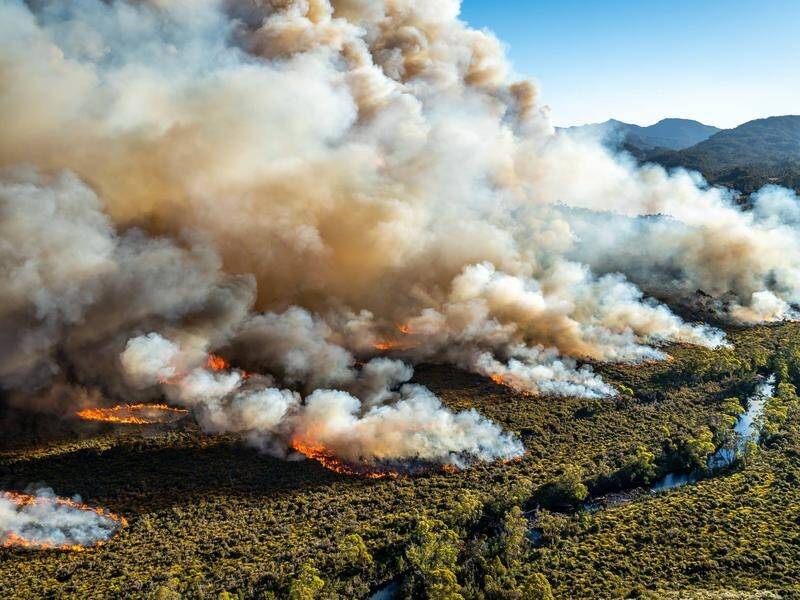 A number of towns are at risk as volatile conditions cause bushfires to flare up across Tasmania.