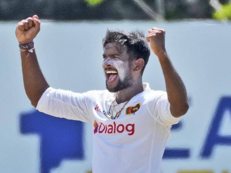 Sri Lankan spinner Ramesh Mendis celebrates one of his six wickets against the West Indies.