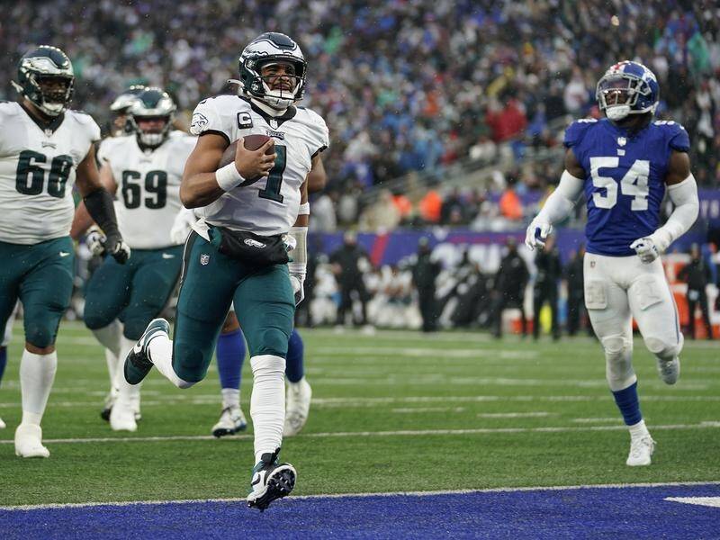 Philadelphia QB Jalen Hurts had a night out in the Eagles' big NFL win over the New York Giants. (AP PHOTO)