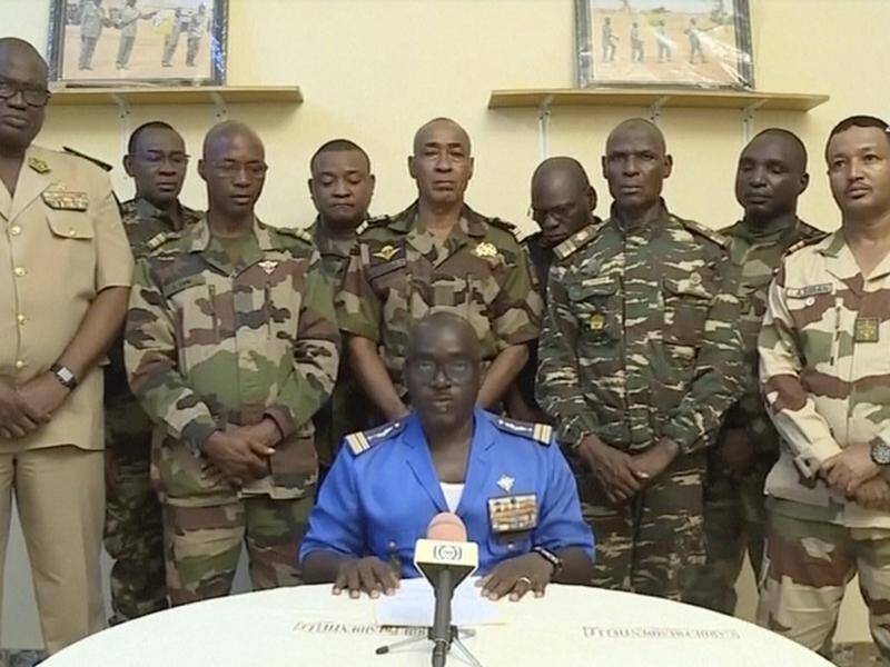 Soldiers have appeared on TV in Niger to announce they have staged a coup to remove the president. (AP)
