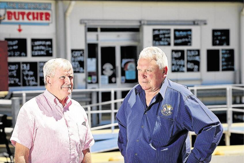 Launceston alderman Ted Sands with Lethborg's owner Gary Lethborg ... the St Leonards meat distributor has downsized its operations and closed its on-site retail outlet. Picture: PHILLIP BIGGS