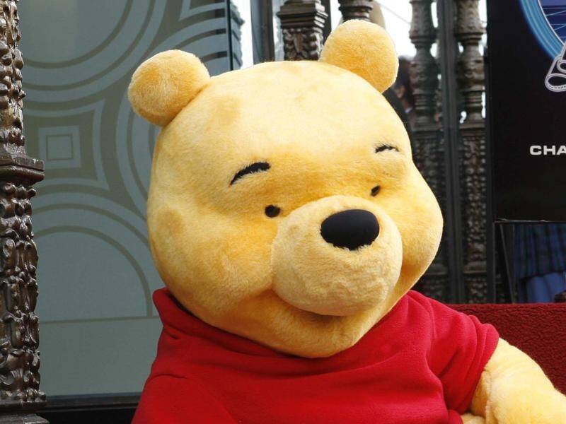 Winnie the Pooh is celebrating 95 years by visiting the Queen at Windsor Castle in a new animation.