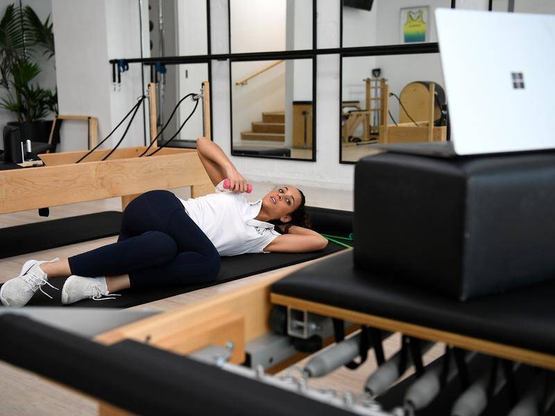 Tara Dighton has taken her physio and pilates classes online to save her Sydney studio.
